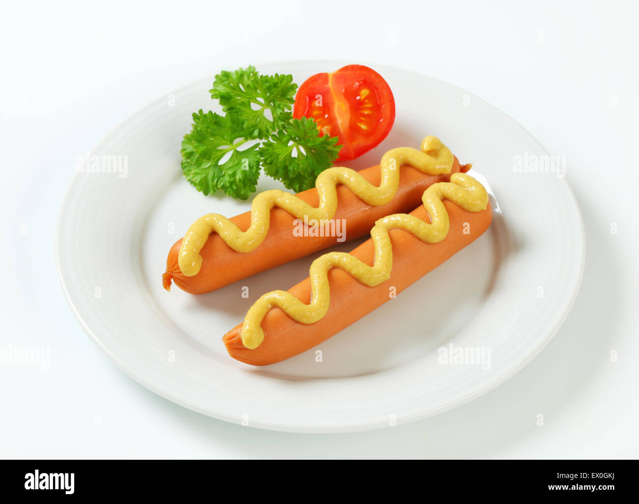 Frankfurter Würstchen mit Senf-sauce Stockfoto