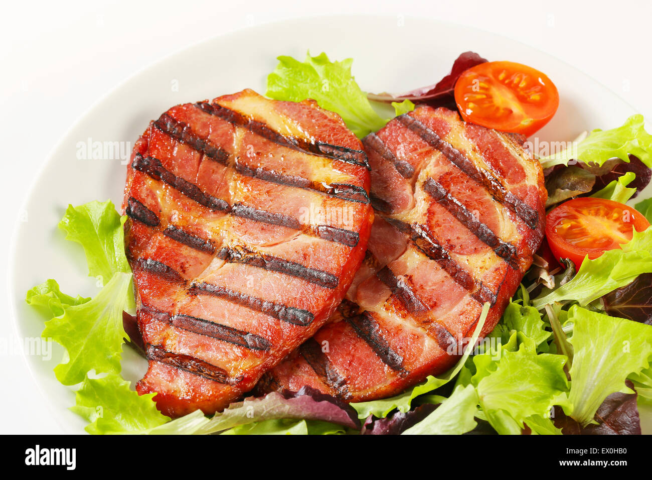 Gegrilltes Schweinefleisch mit Salat Hals Stockfoto