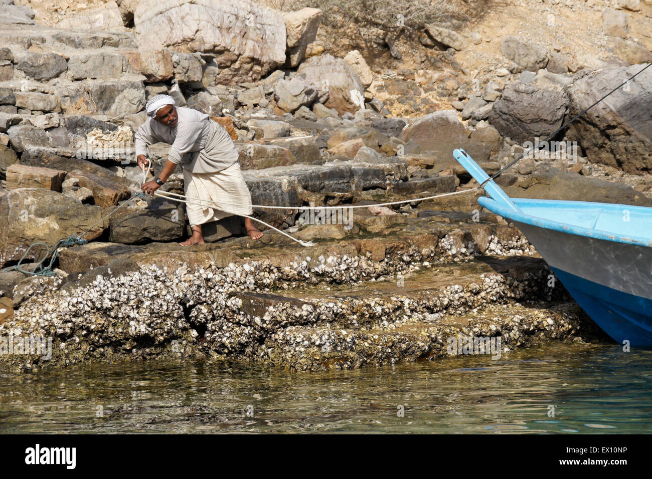 Fischer Boot auf Telegraph Insel, Halbinsel Musandam, Oman zu binden Stockfoto