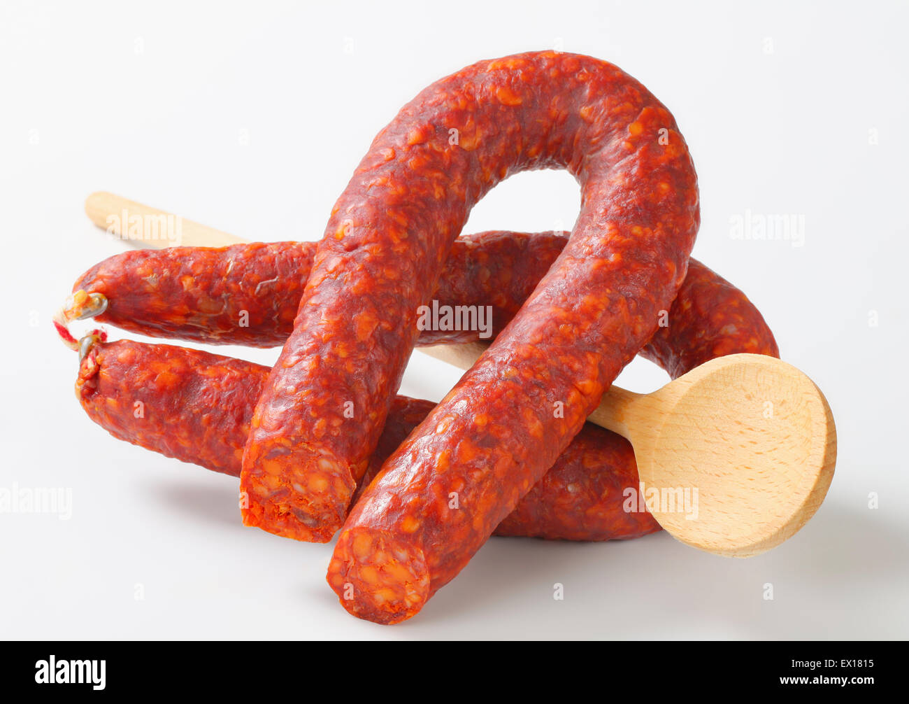 Trockenen Paprikawürste und Holzlöffel Stockfoto