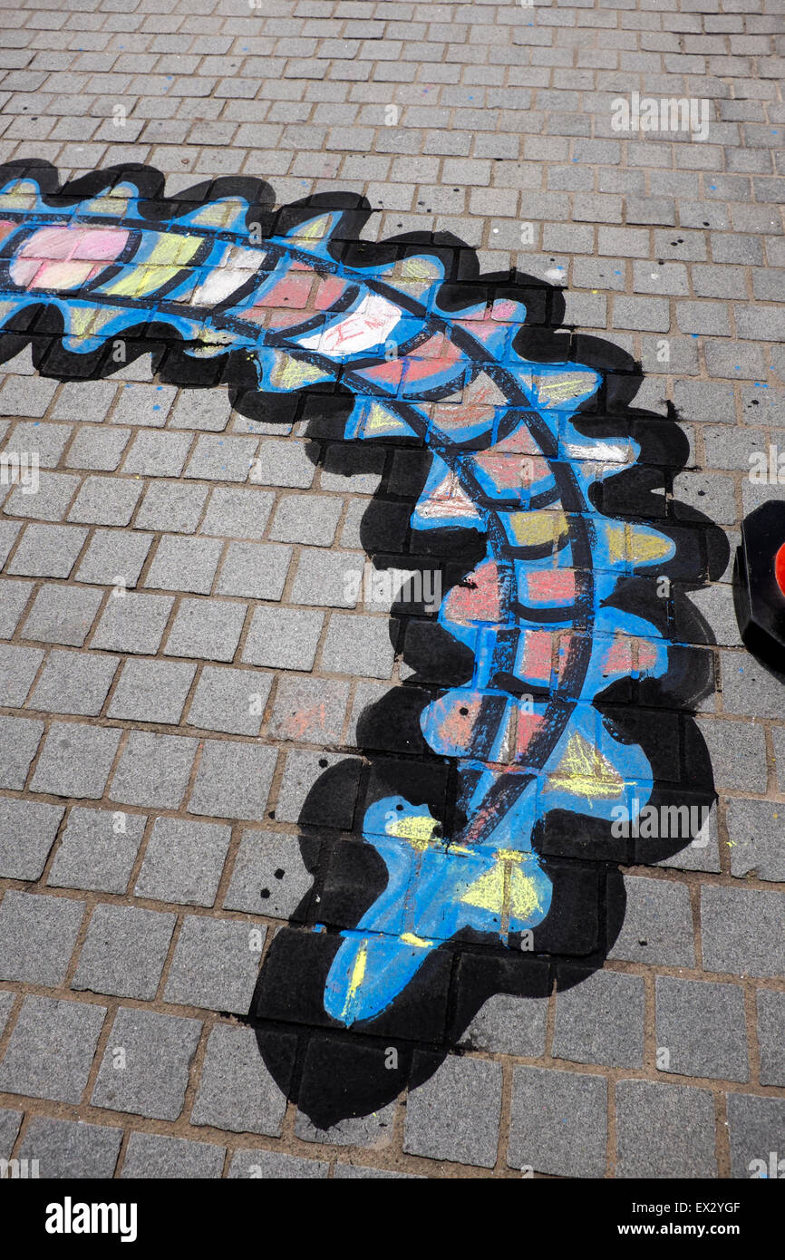 Street Art Paint Gehweg Pflaster Fett Tail Stockfoto