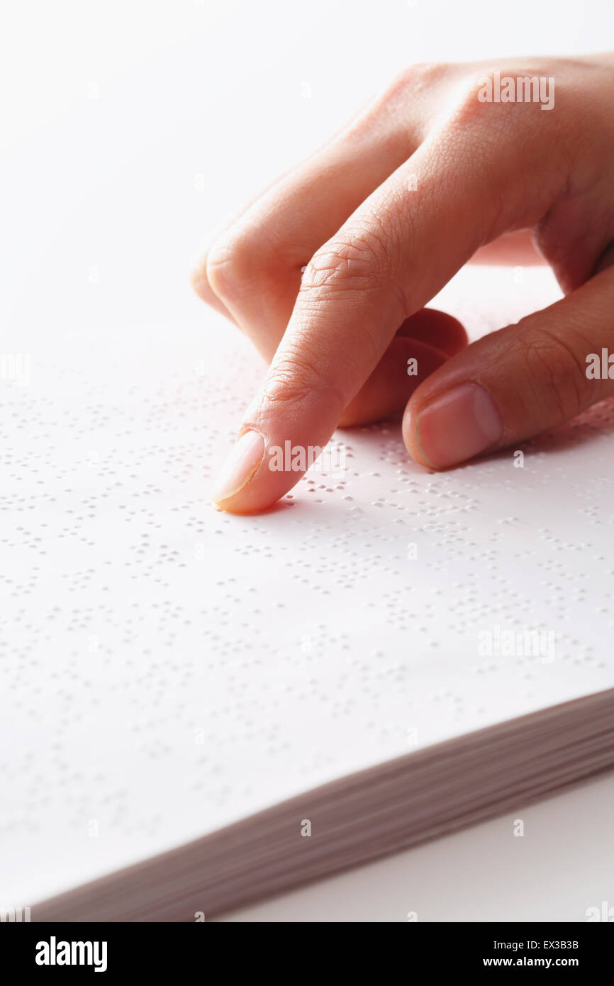 Hand lesen Blindenschrift-Papier Stockfoto