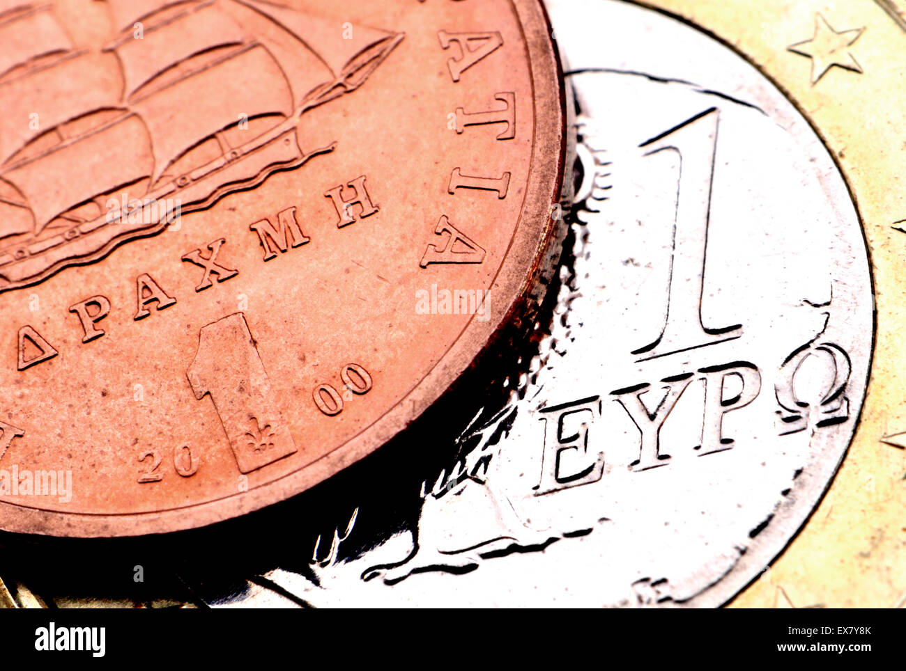 1 der griechischen Drachme und 1 Euromünzen Stockfoto