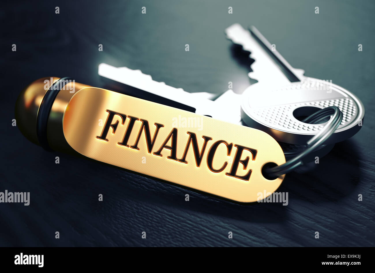 Finanzen, geschrieben am goldenen Schlüsselanhänger. Stockfoto