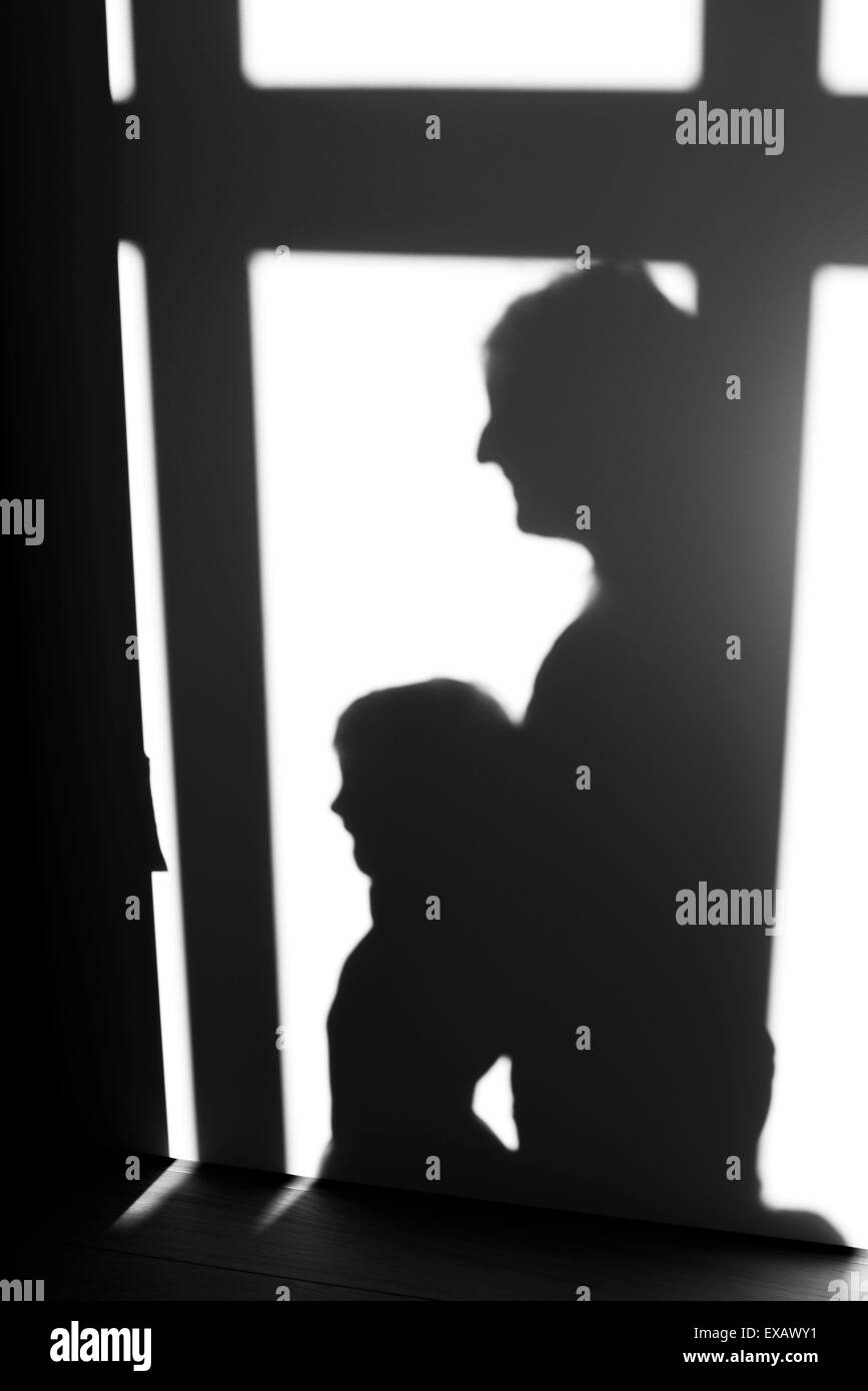 Schatten von Eltern und Kind Stockfoto