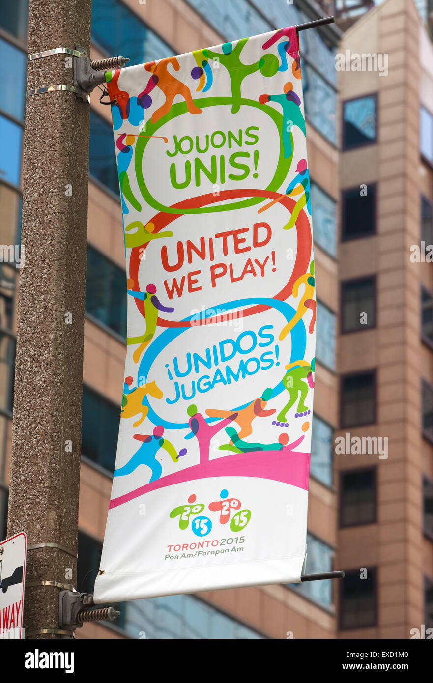 2015 Spiele PanAm Banner mit "United spielen wir" Motto in drei verschiedenen Sprachen (TORONTO, Kanada) Stockfoto