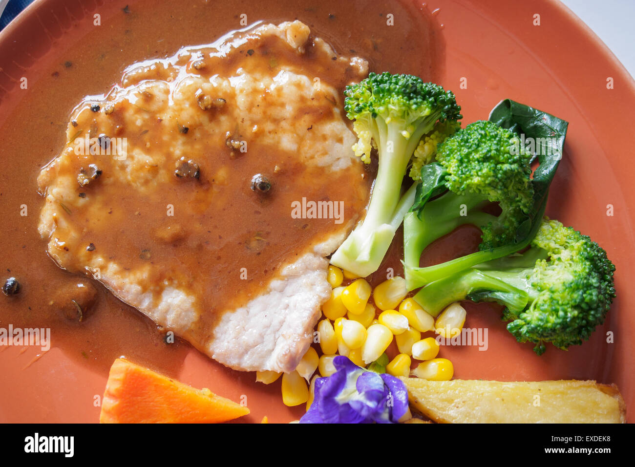 Schweineschnitzel mit Pfeffer-sauce Stockfoto