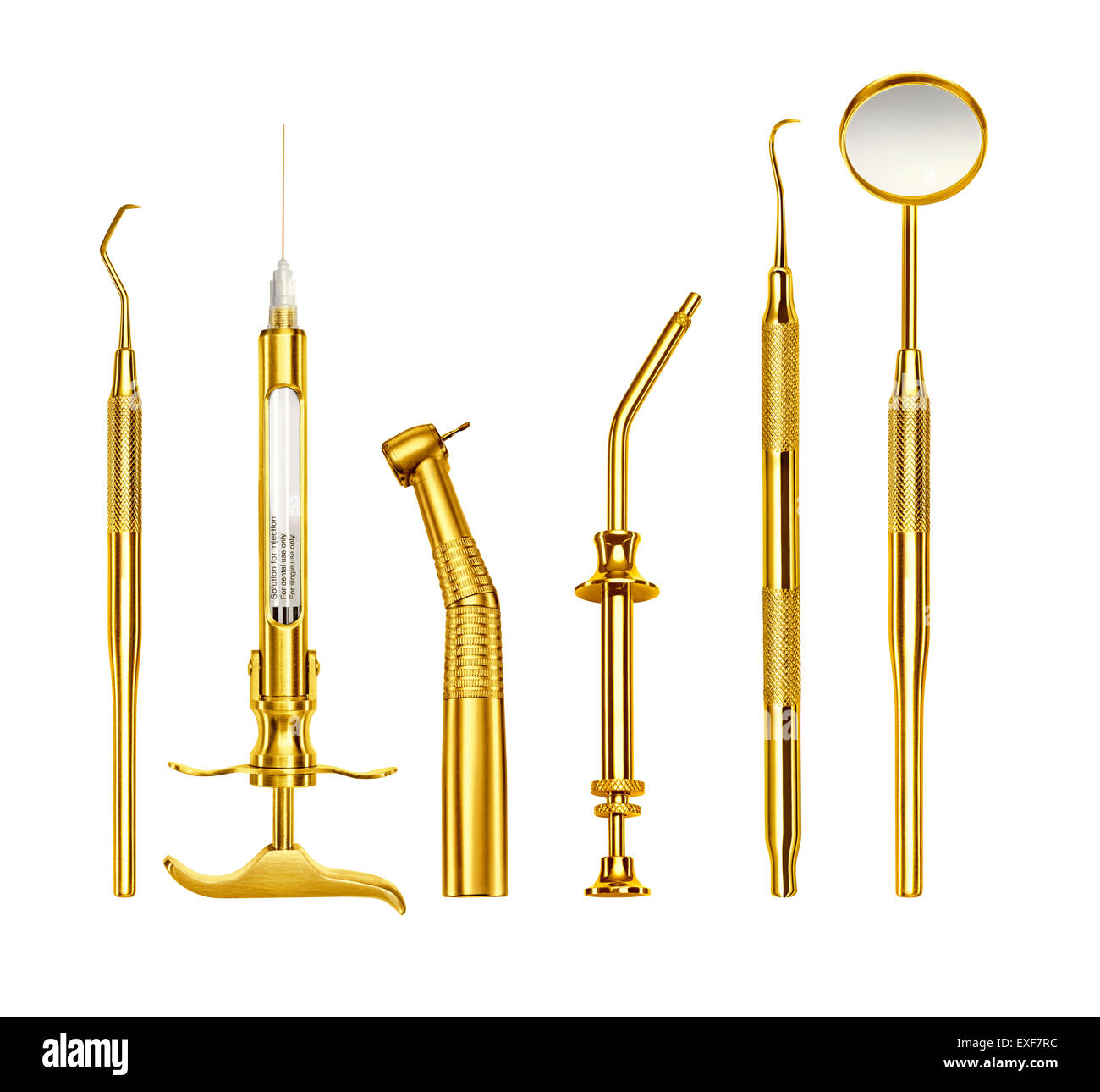 Eine Reihe von gold Zahnarzt Werkzeuge Stockfoto