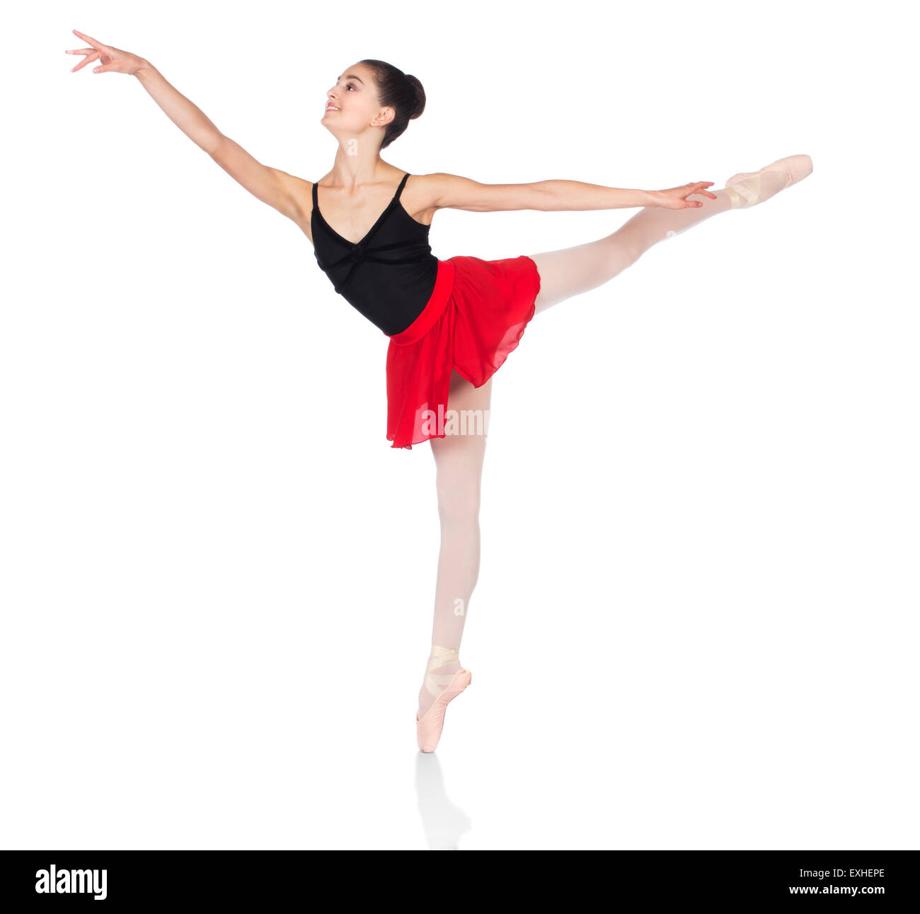 Schönen weiblichen Balletttänzer isoliert auf einem weißen Hintergrund. Ballerina trägt einen schwarzen Anzug, rosa Strümpfe, Pointe Schuh Stockfoto