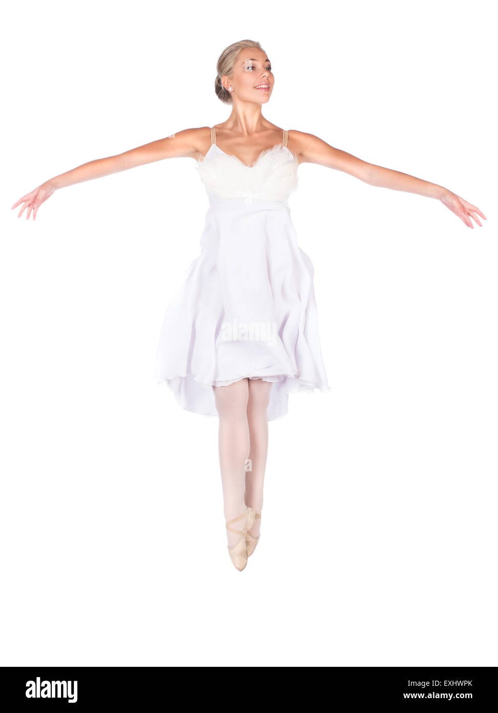 Schönen weiblichen Balletttänzer isoliert auf einem weißen Hintergrund. Ballerina trägt ein weißes Kleid gefiederten und Spitzenschuhe. Stockfoto