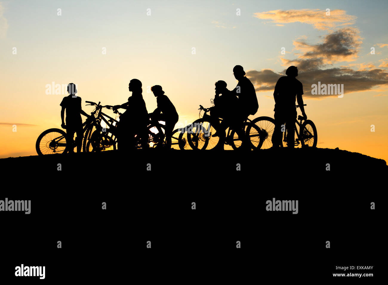 Bande Bike und gelbe Sonnenuntergang Stockfoto