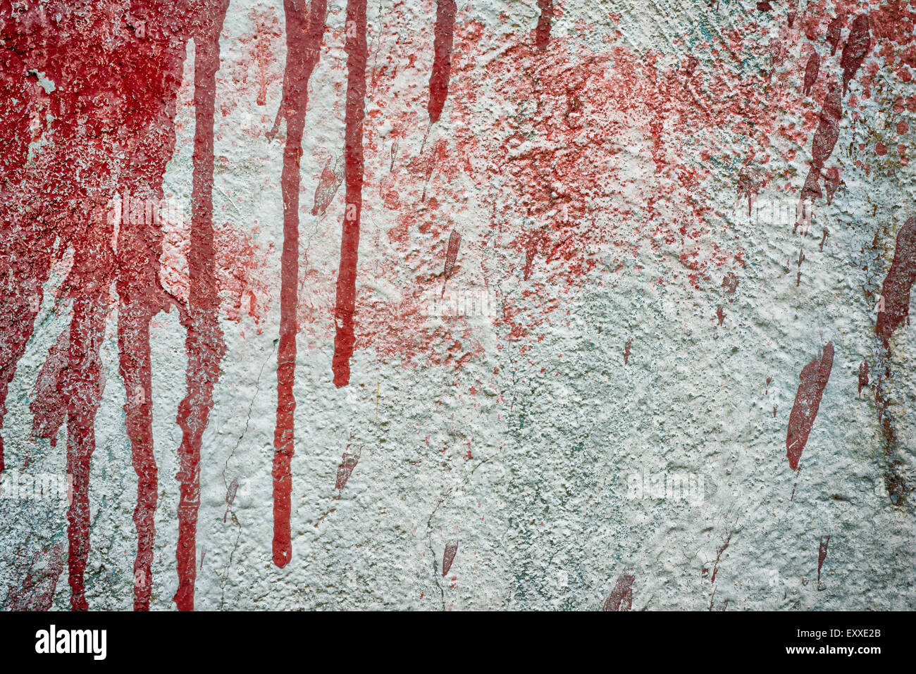 Schmutzige Wand mit Flecken der Farbe Stockfoto