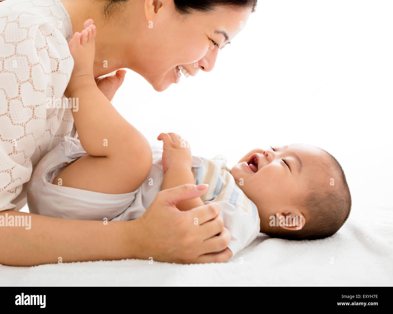 glückliche Mutter mit lächelnden Baby boy Stockfoto