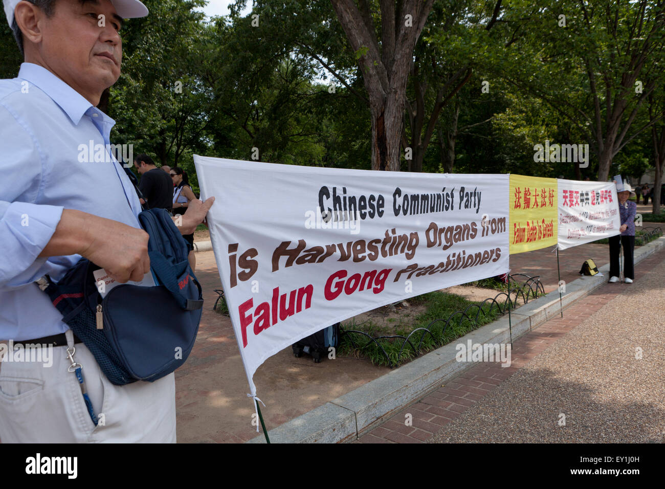 Falun Gong-Praktizierende protestieren gegen chinesische kommunistische Partei - Washington, DC USA Stockfoto