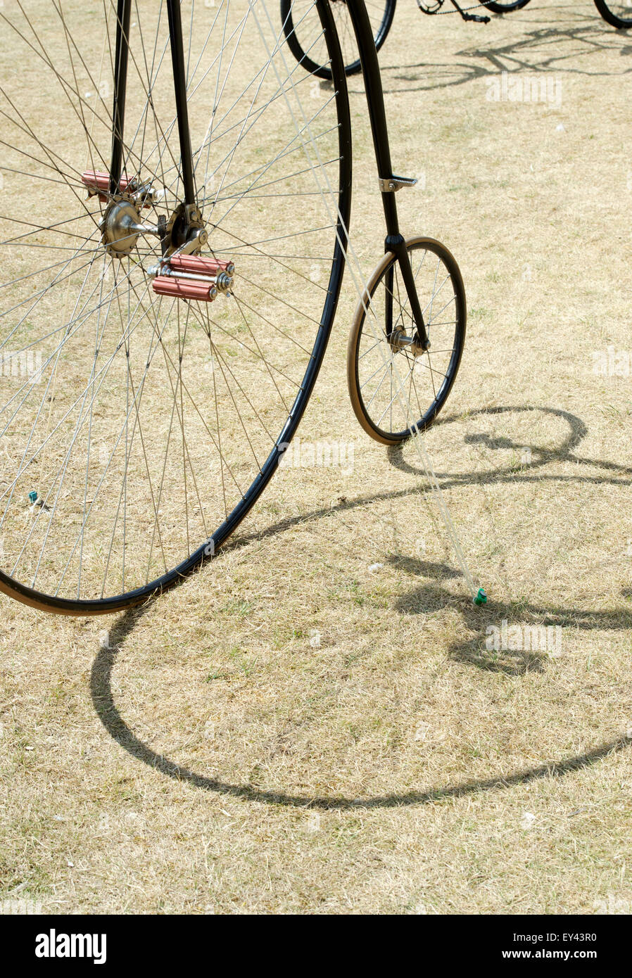Hochrad Fahrrad und Schatten abstrakt Stockfoto
