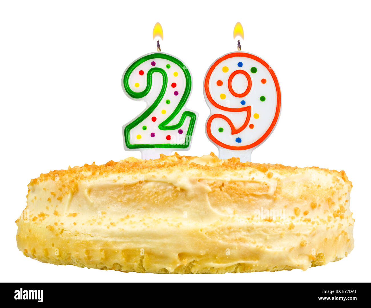 Geburtstagstorte mit Kerzen Nummer neunundzwanzig isoliert auf weißem Hintergrund Stockfoto