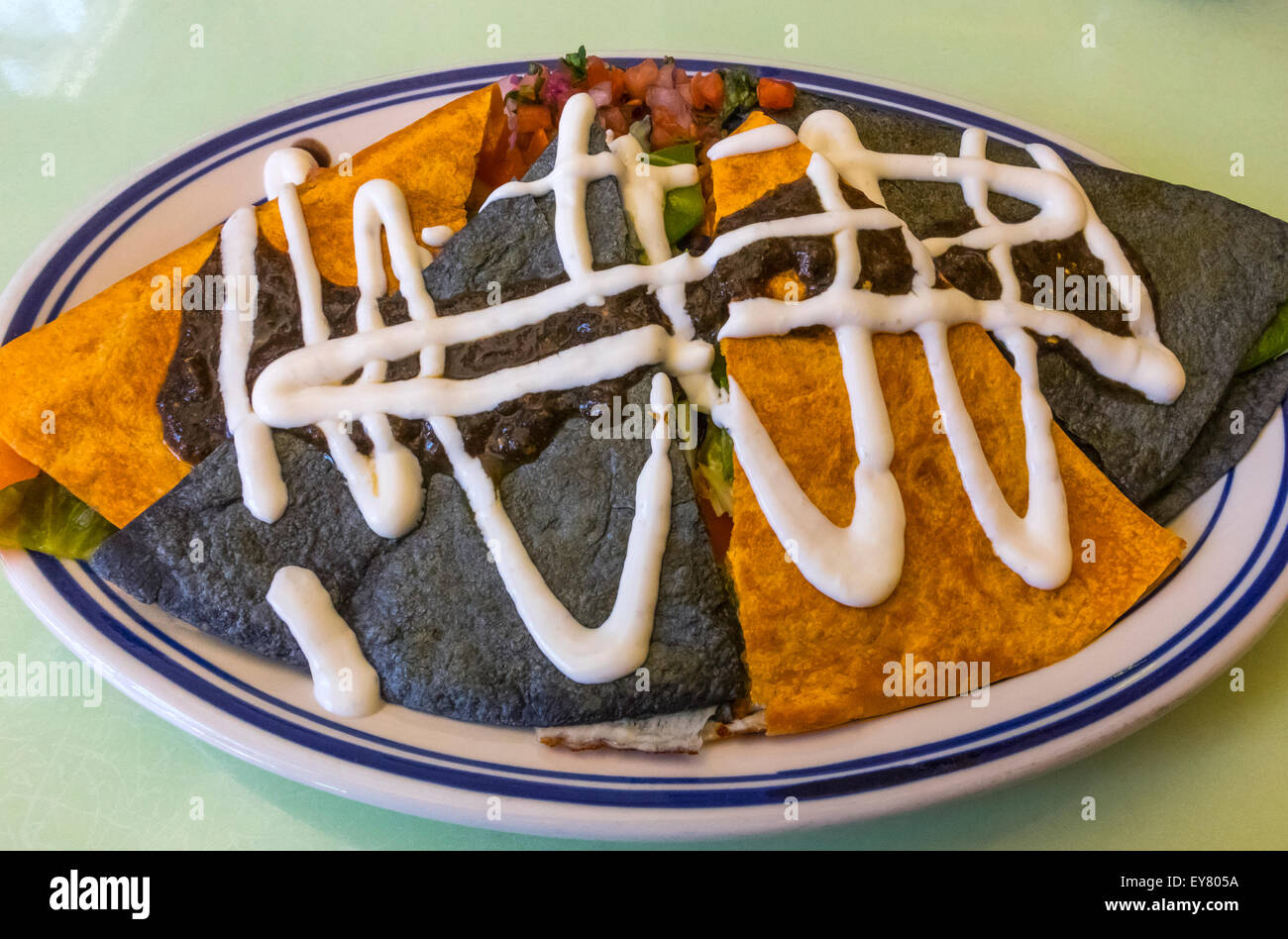 Café Habana kubanische-Mexikanisch Essen serviert in Nolita: ein Gemüse "Picadillo" Quesadillas Stockfoto