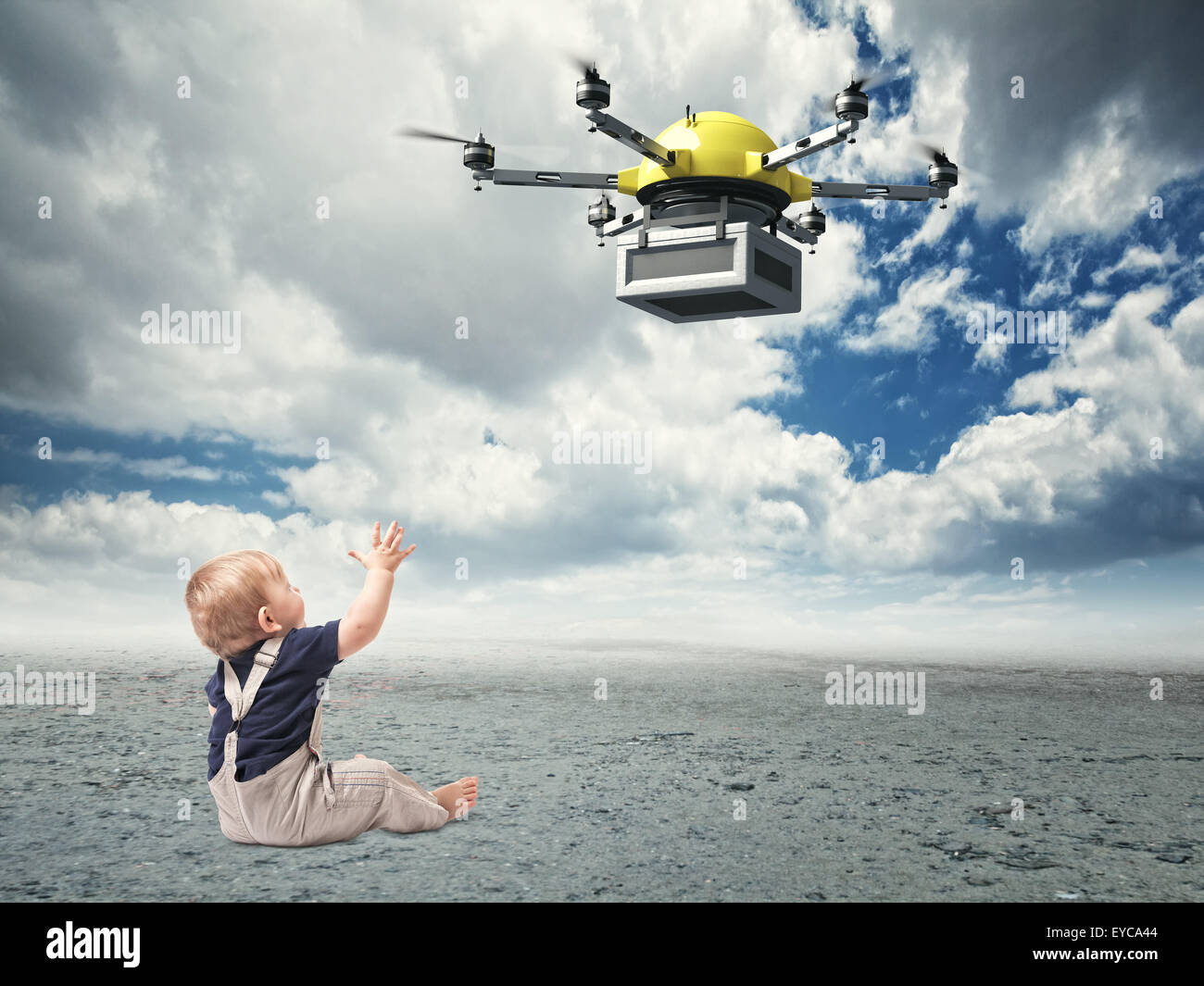 sitzen Sie wenig Kind aussehen moderner Drohne Stockfoto