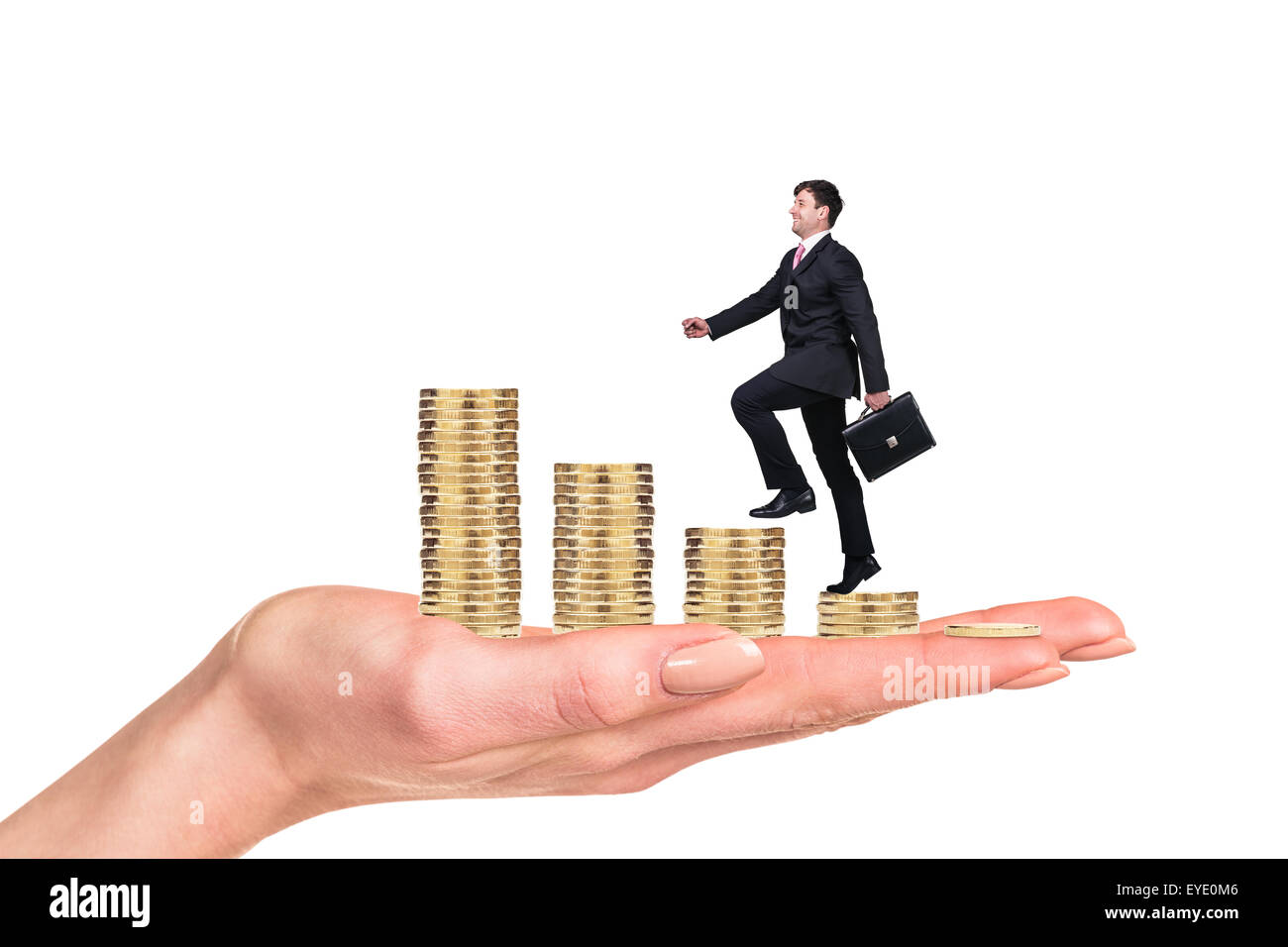 Business-Mann auf Münzen Leiter klettern Stockfoto