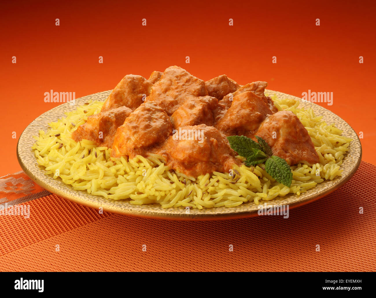 INDISCHE BUTTER CHICKENCURRY & BASMATI-REIS Stockfoto