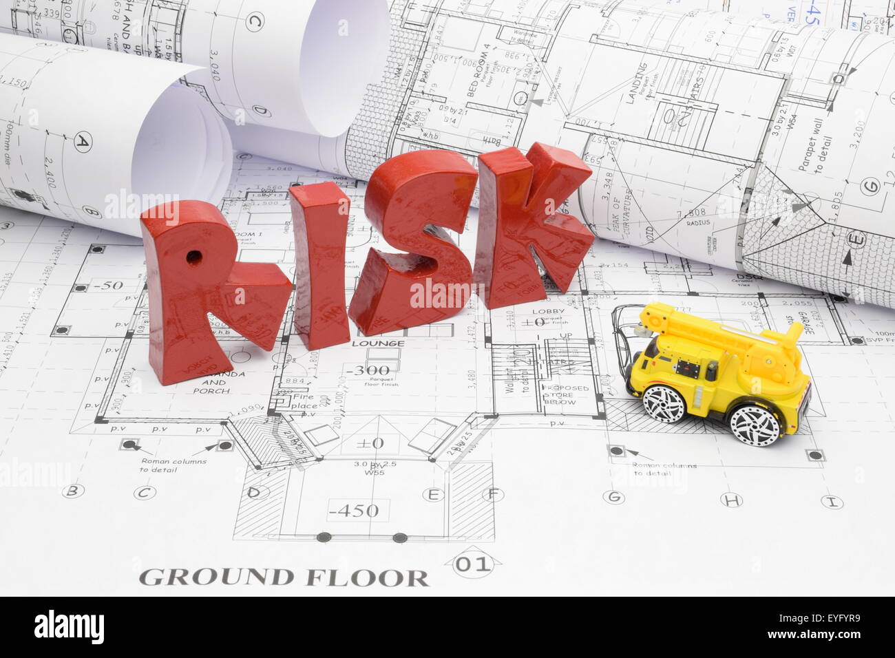 Blaupausen und Risiko in das Bauprojekt. Stockfoto