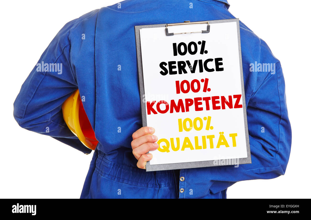 Deutsche Arbeiter mit Motto 100 % Service, Kompetenz, Qualitaet "(100 % Service, Kompetenz, Qualität) auf einem Klemmbrett Stockfoto