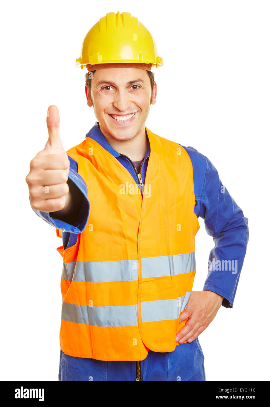Lächelnd Bauarbeiter mit Helm, die Daumen hochhalten Stockfoto