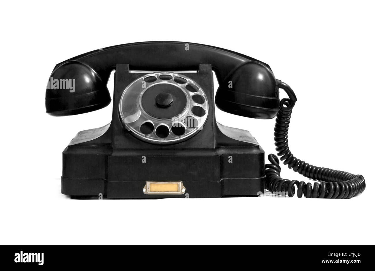 altes Telefon isoliert auf weiss Stockfoto