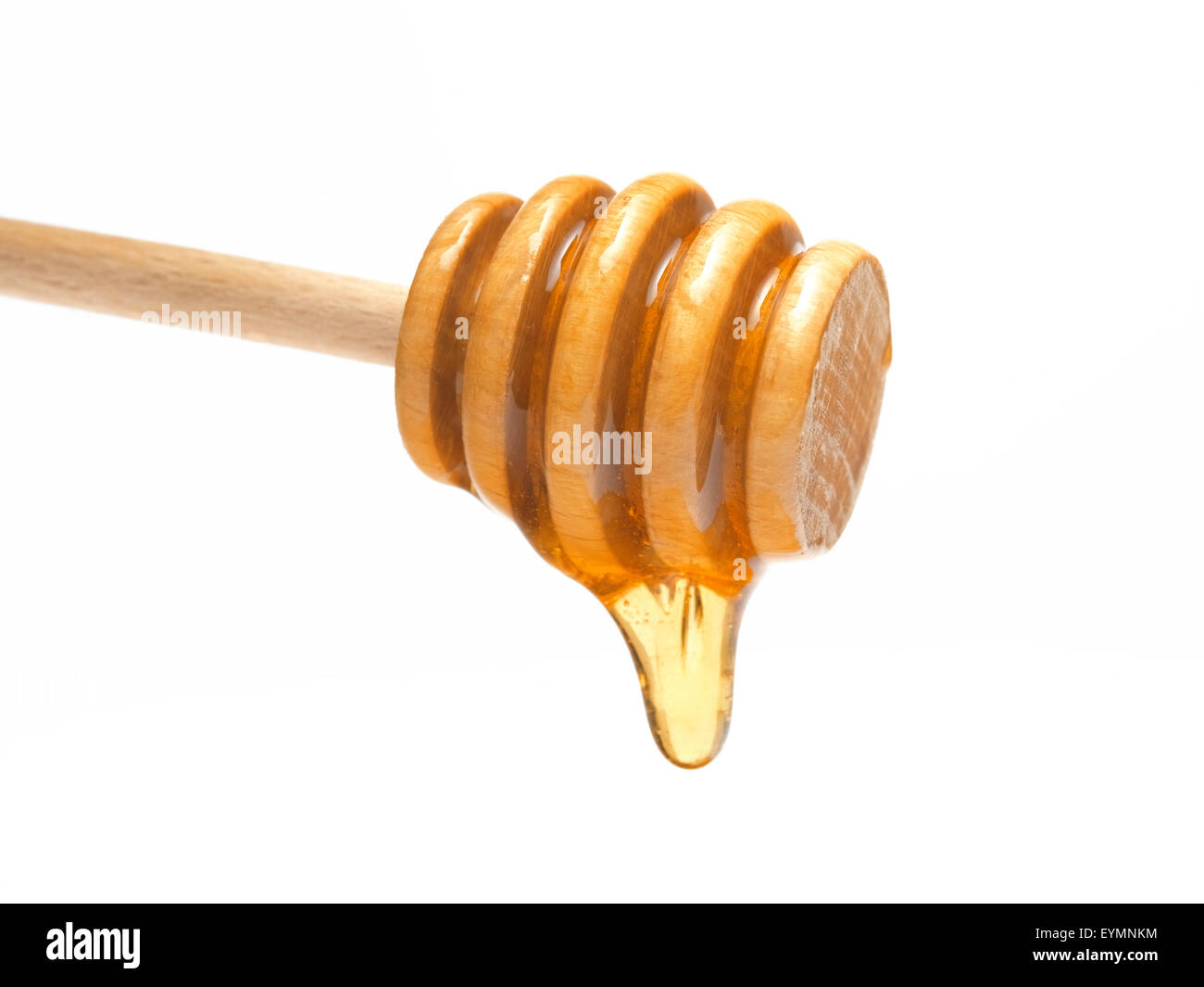 Hölzerne Honig Wagen mit goldener Honig Tropfen Stockfoto