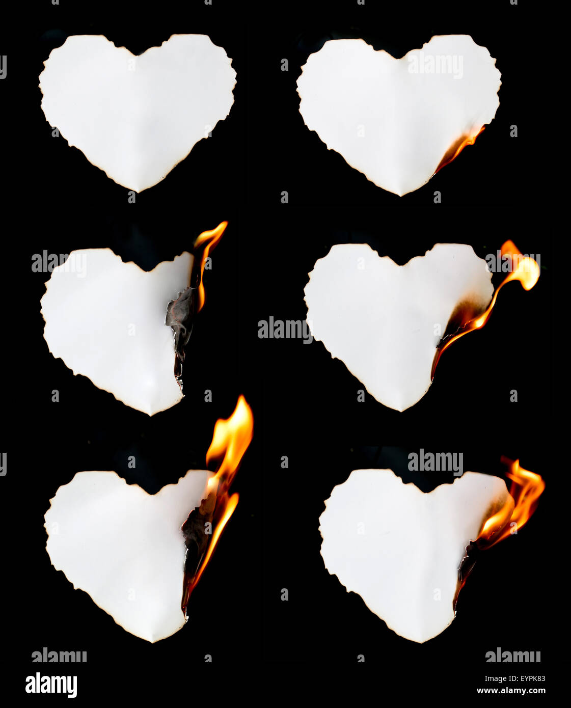 Herz Form Papier Brennen auf schwarzem Hintergrund Stockfoto