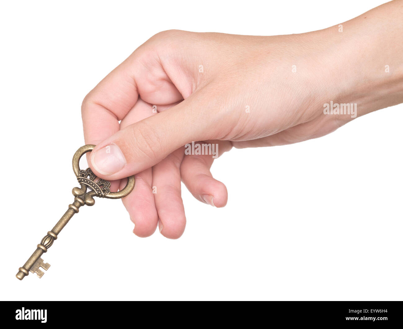 Frau Hand mit alten Schlüssel isoliert auf weißem Hintergrund Stockfoto