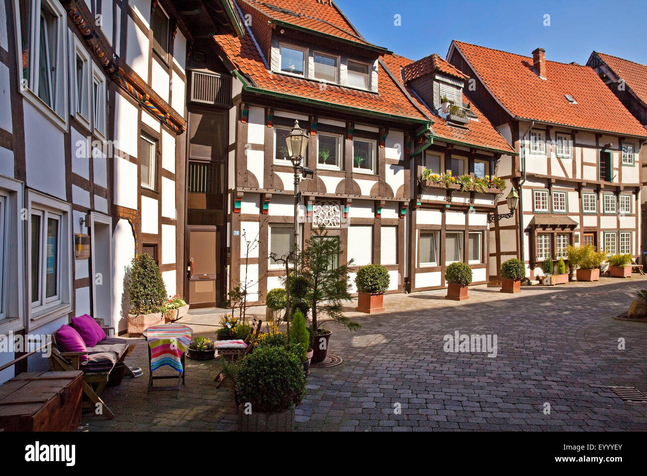 alten Kirchplatz mit Fachwerkhäusern in Gütersloh, Ostwestfalen, North Rhine-Westphalia, Gütersloh, Deutschland Stockfoto