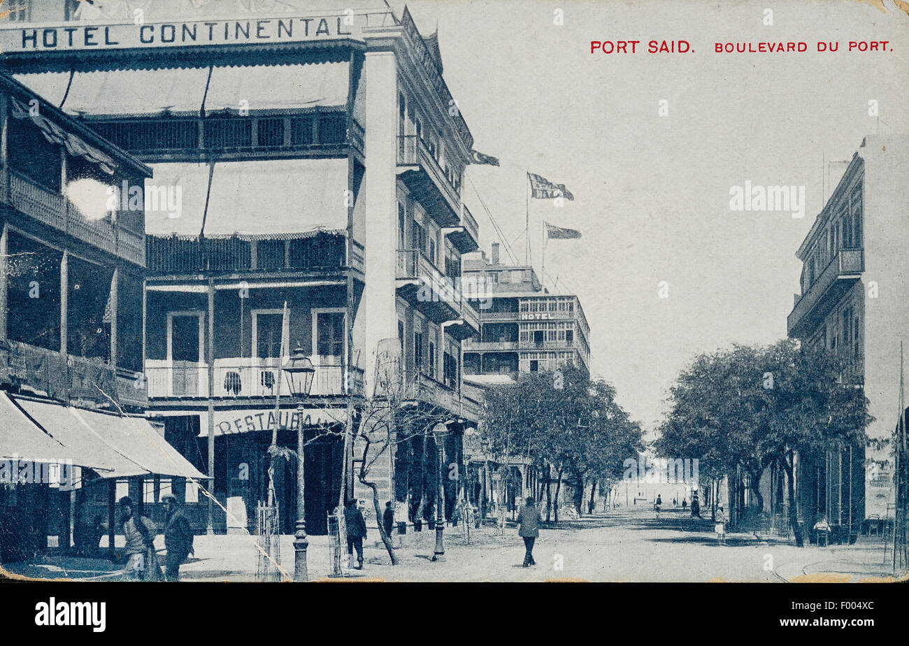 Port Said, Ägypten - 1900 s - eine Postkarte von der Suez-Kanal-Stadt an der Mündung des Suez-Kanals am Mittelmeer, ein Blick auf den Boulevard du Hafen.   COPYRIGHT FOTOSAMMLUNG VON BARRY IVERSON Stockfoto