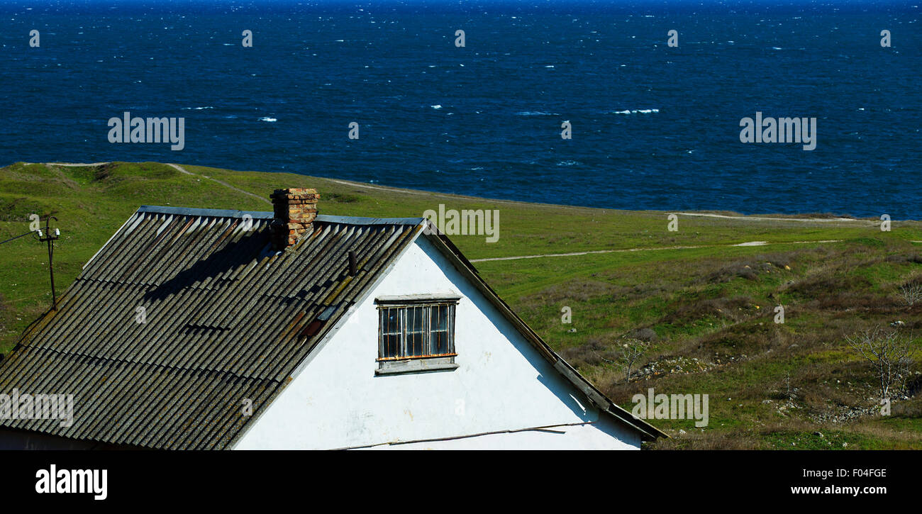 Altes Haus am Meer Stockfoto