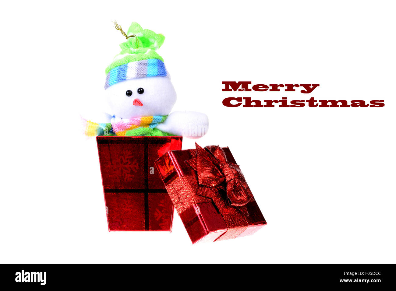 Kleine rote Weihnachten Geschenk-Box mit einem Schneemann im Inneren Stockfoto