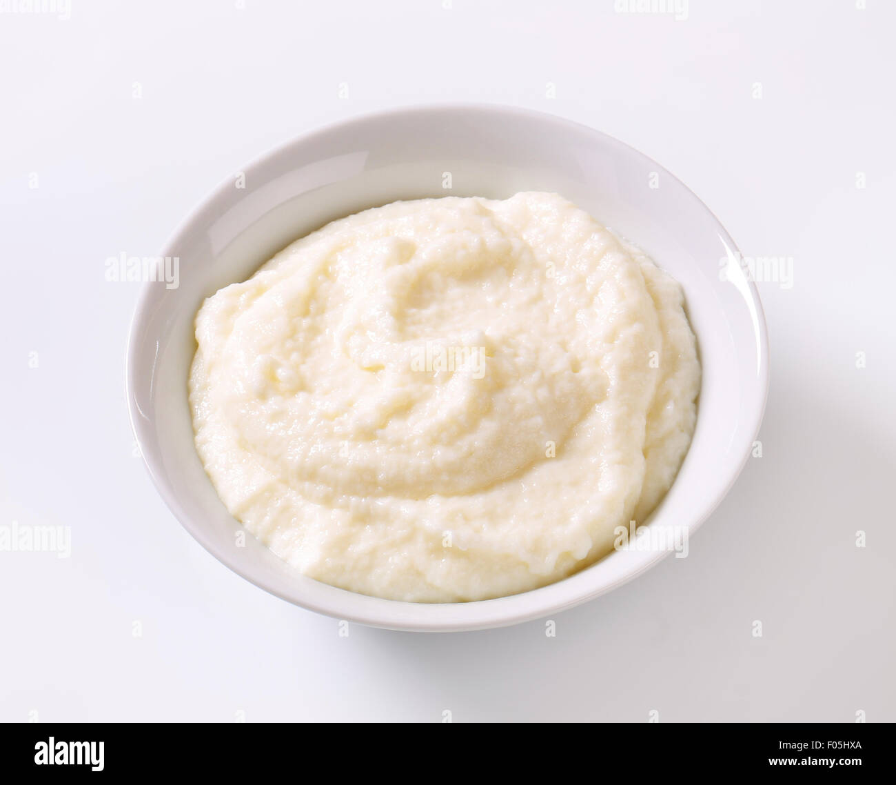 Schüssel mit Milch Milchreis Stockfoto