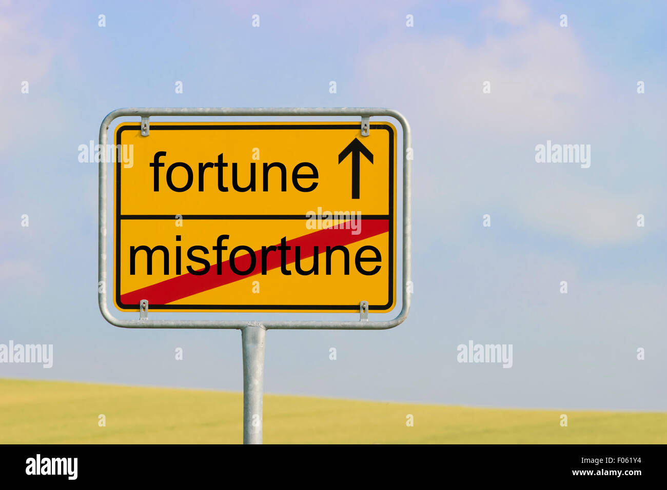 Gelbe Ortstafel mit Text "Unglück Fortune" Stockfoto