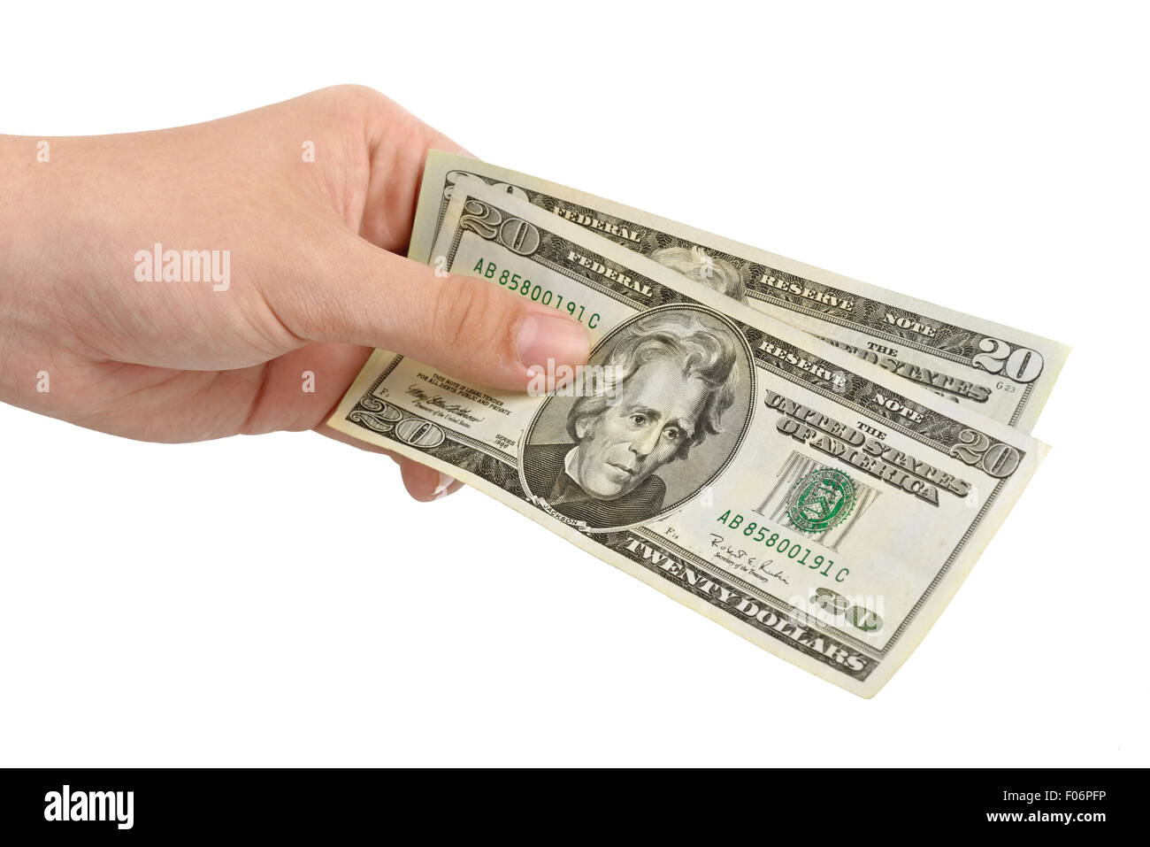 Hand mit Geld Dollar isoliert auf weißem Hintergrund Stockfoto