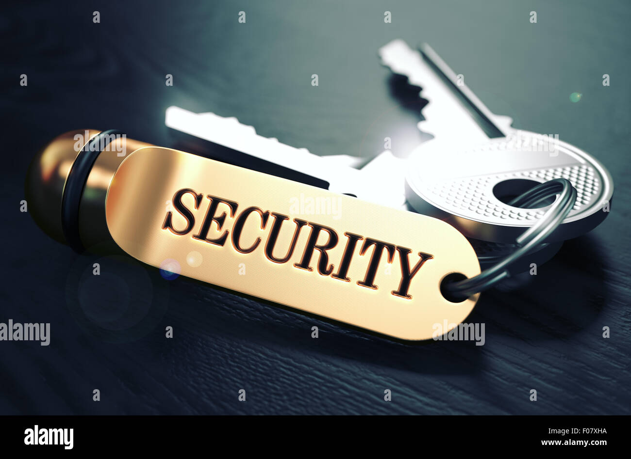Security-Konzept. Tasten mit goldenen Schlüsselanhänger. Stockfoto