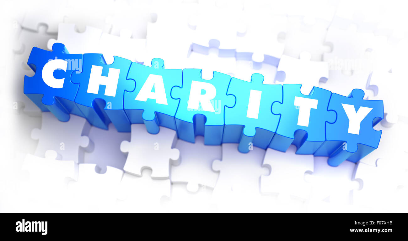 Charity - Rätsel Wort auf blau. Stockfoto