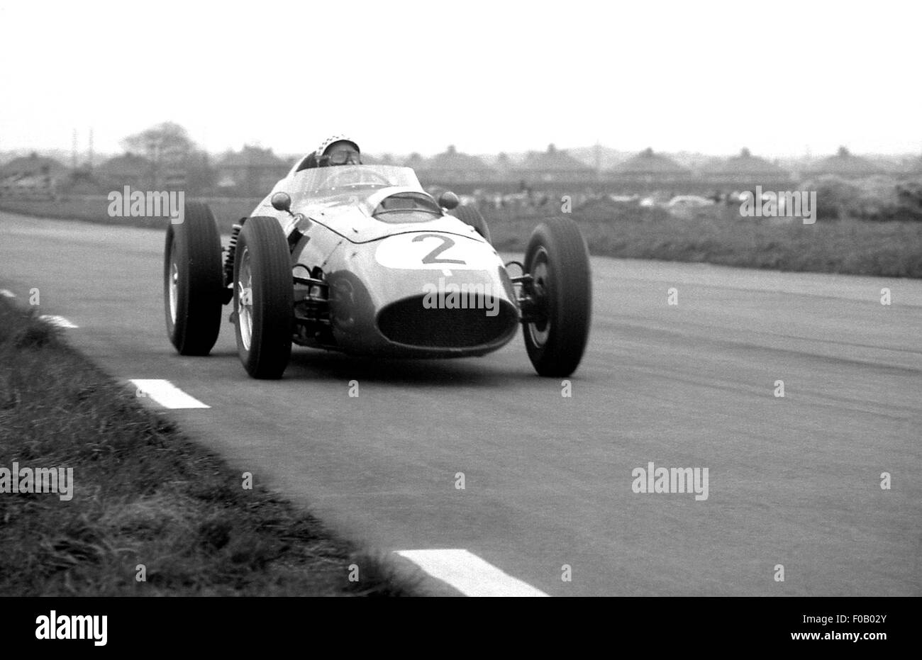 XIV BARC Aintree 200 18. April 1959. Jean Behra Ferrari Dino 246 Rennsieger. Stockfoto