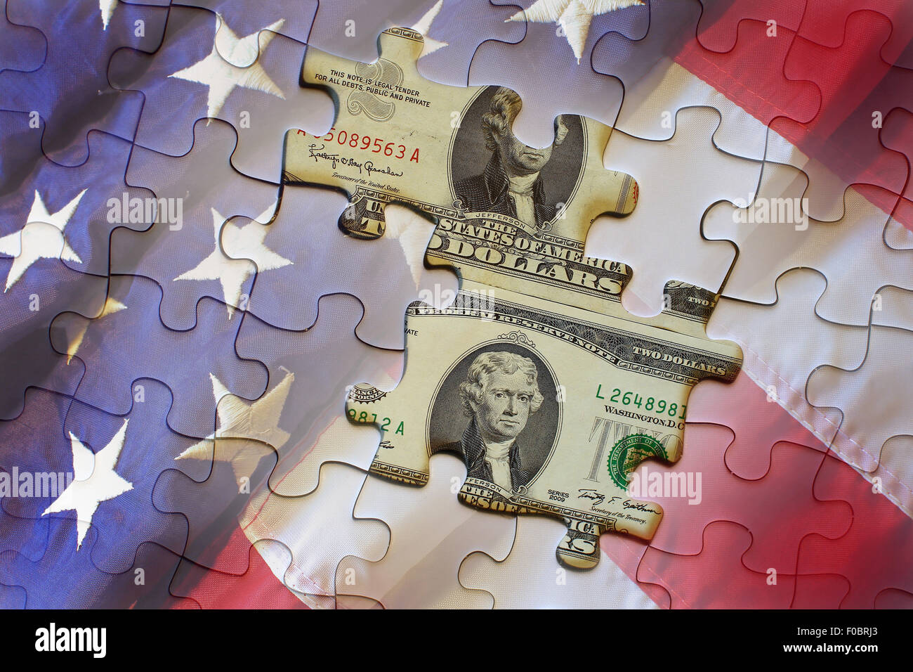 Vereinigten Staaten Geldschein Vs Notenbank Hinweis gegen eine amerikanische Flagge puzzle Stockfoto