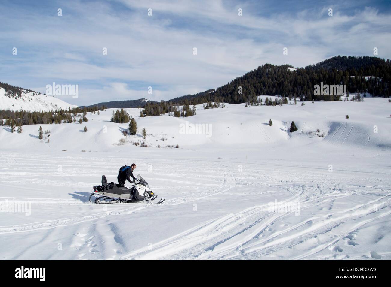 Mann mit Motorschlitten, Jackson Hole, Wyoming Stockfoto Mann mit Motorschlitten, Jackson Hole, Wyoming Stockfoto
