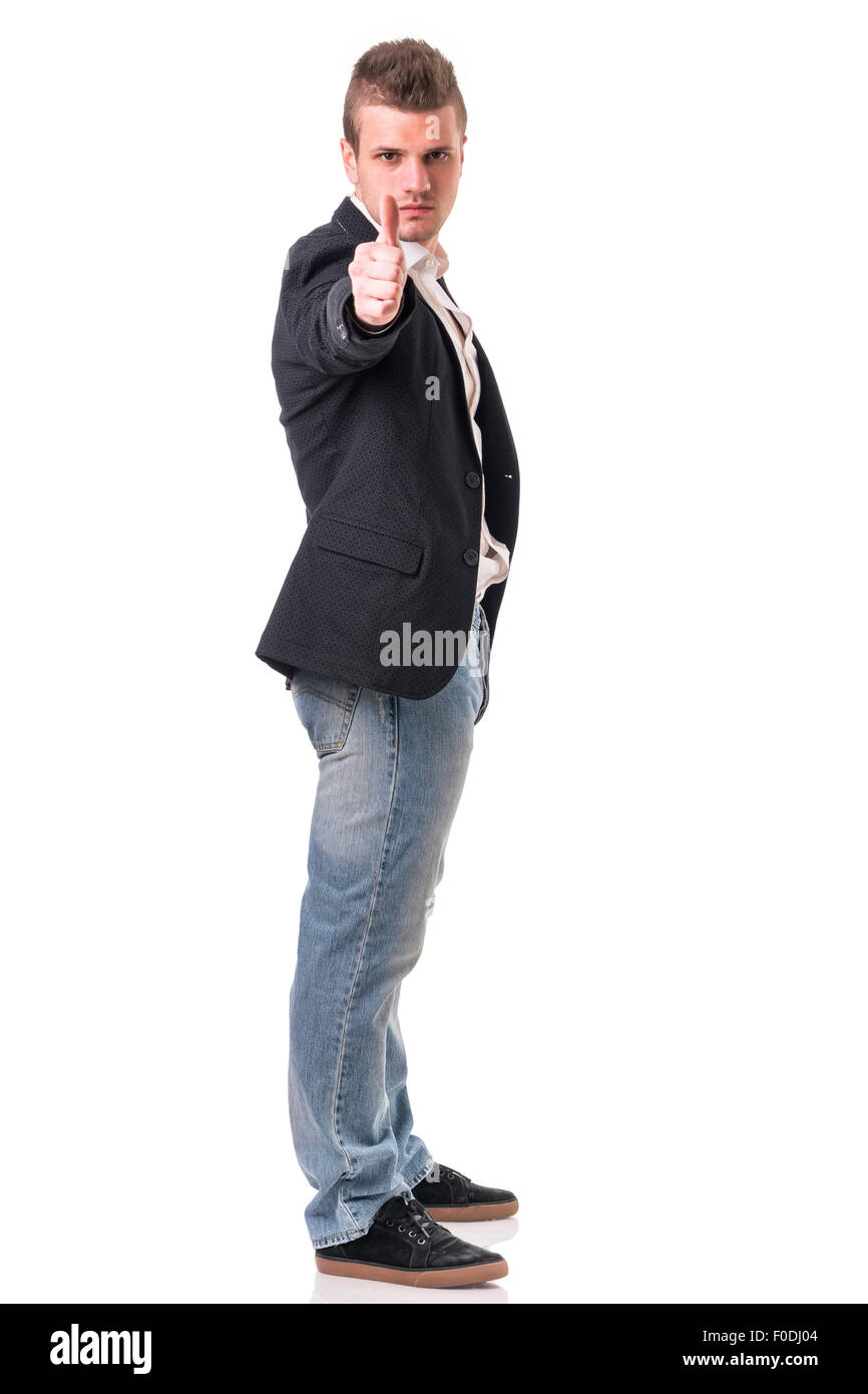 Eleganter Mann mit Gewehr, als Spion oder Geheimagent mit Kopfhörer, isoliert auf weiss gekleidet. Vollständige Abbildung erschossen Stockfoto