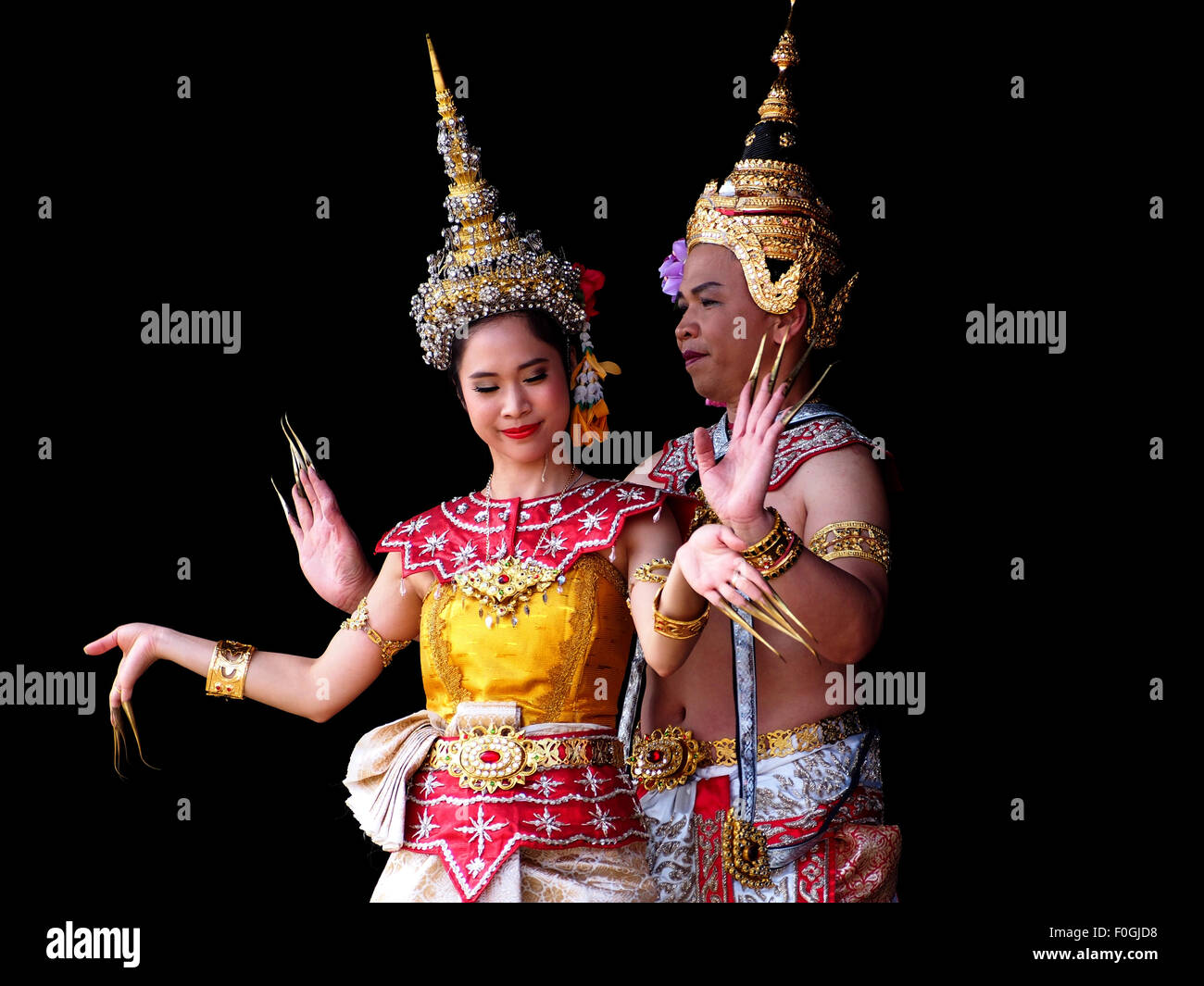 Männliche und weibliche Tänzer in traditionellen Thai Kostüm Stockfoto