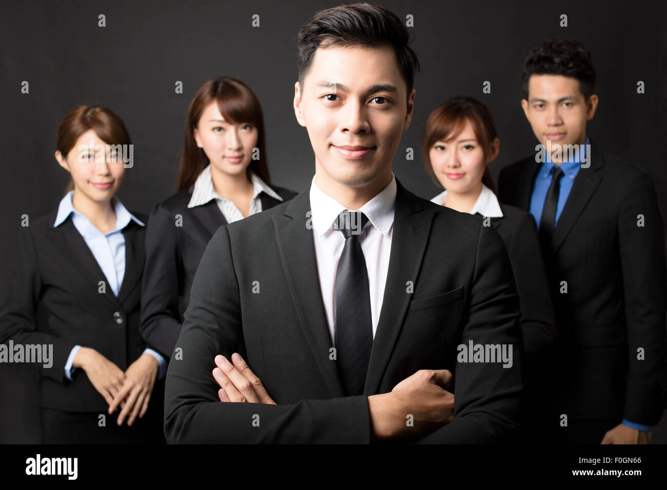 junger Geschäftsmann mit erfolgreichen Business-team Stockfoto