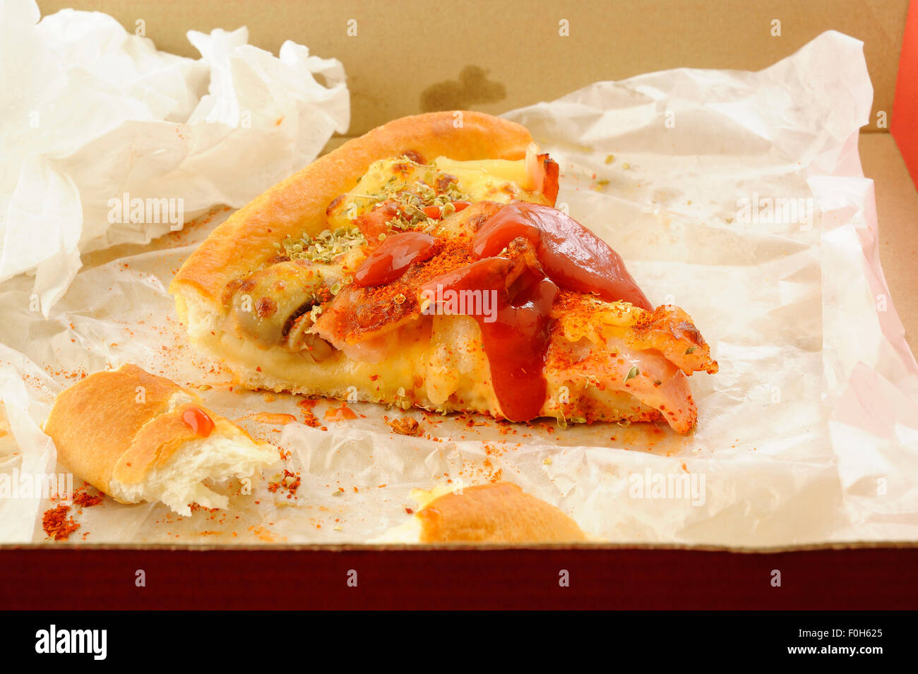 Stück Pizza in der box Stockfoto