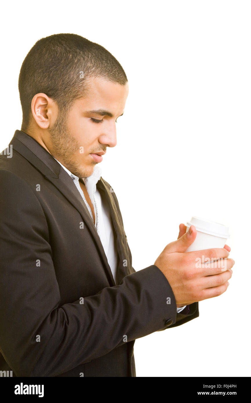 Manager, die Erwärmung seine kalten Hände auf eine warme Tasse Kaffee Stockfoto