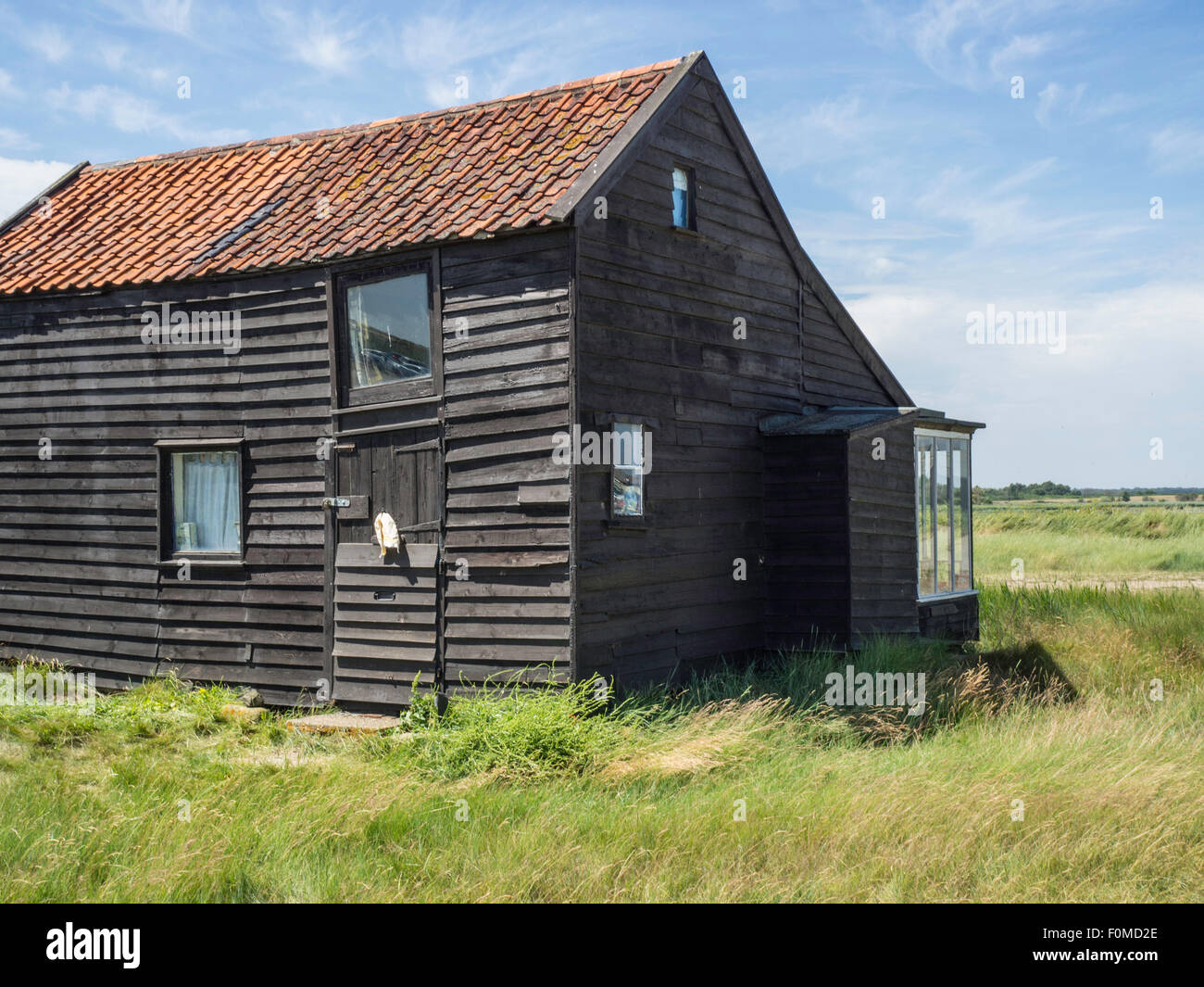 Holzhaus am Hafen von Walberswick Stockfoto