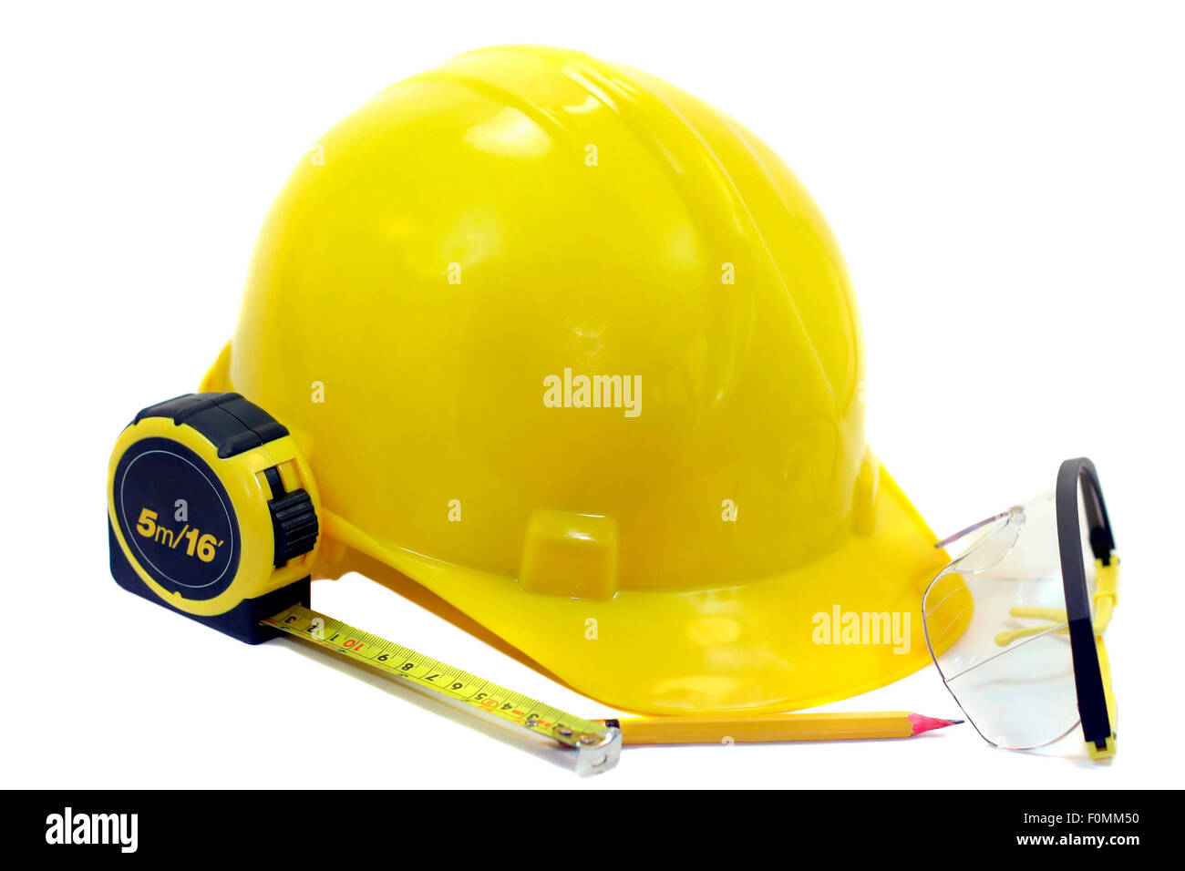 Makroaufnahme einer gelben Helm und tools Stockfoto